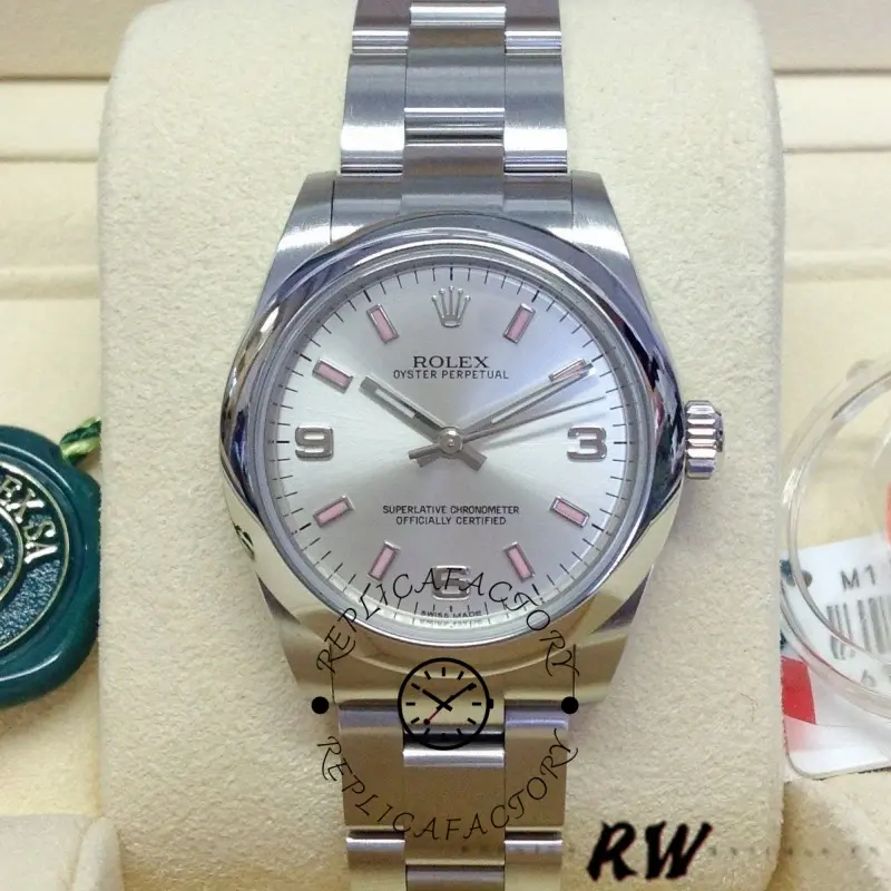 Rolex Oyster Perpetual 177200, wrist-style display on cushion, silver dial and pink markers, 31mm.