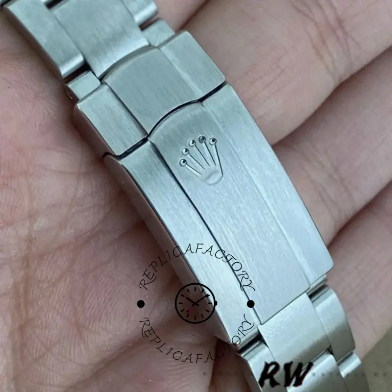 Rolex Oyster Perpetual 177200 clasp close-up, Oyster clasp and engraved crown logo.