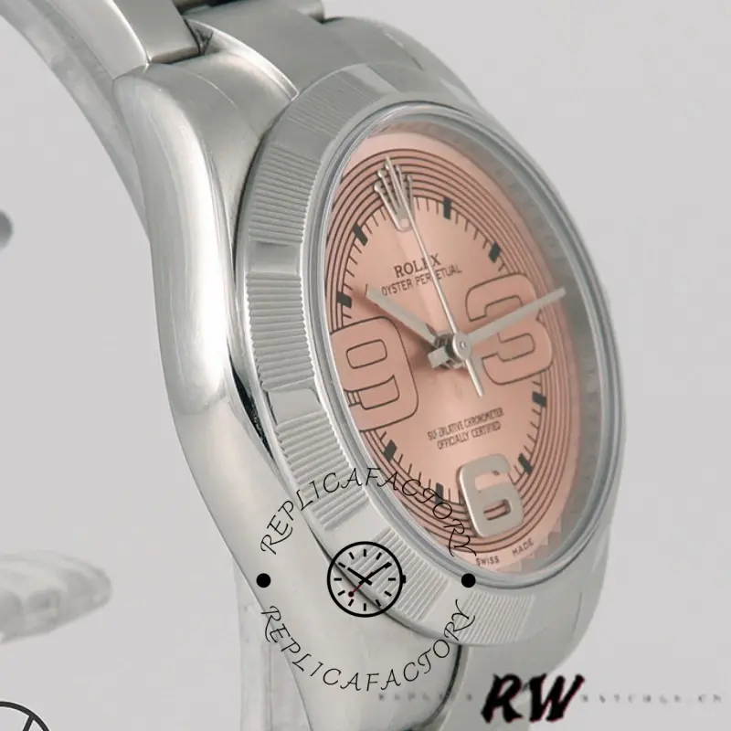 Rolex Oyster Perpetual 177210, side close-up showing case curve, pink Arabic dial, 31mm.