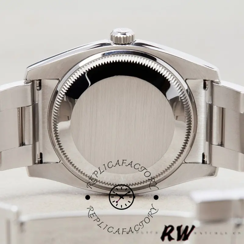 Caseback view of Rolex Oyster Perpetual Date 115234 showing solid back and fluted bezel edge.