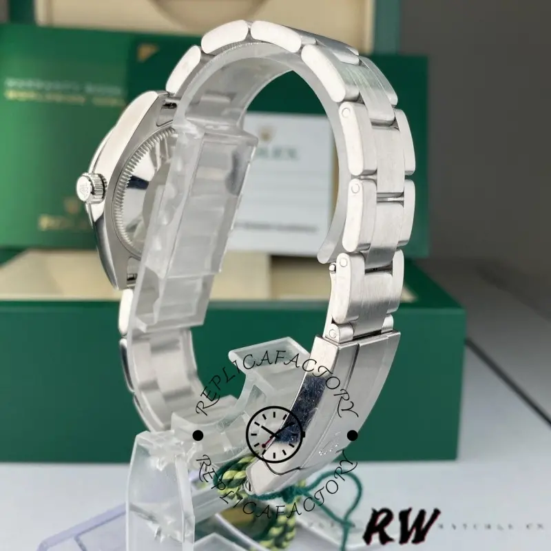 Rear bracelet view of the Rolex Oyster Perpetual 177200 on stand showing clasp and end links.