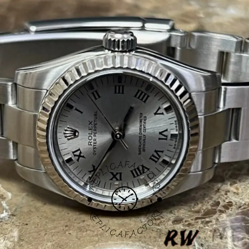 Rolex Oyster Perpetual 176234 angled view, silver Roman dial and bracelet on stone background.