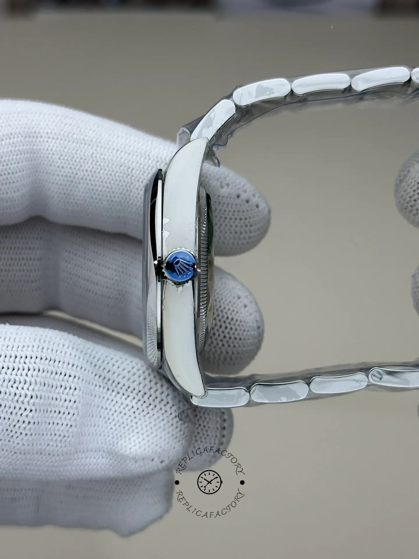 Rolex Oyster Perpetual 36 126000, side view showing bracelet curvature and clasp section.