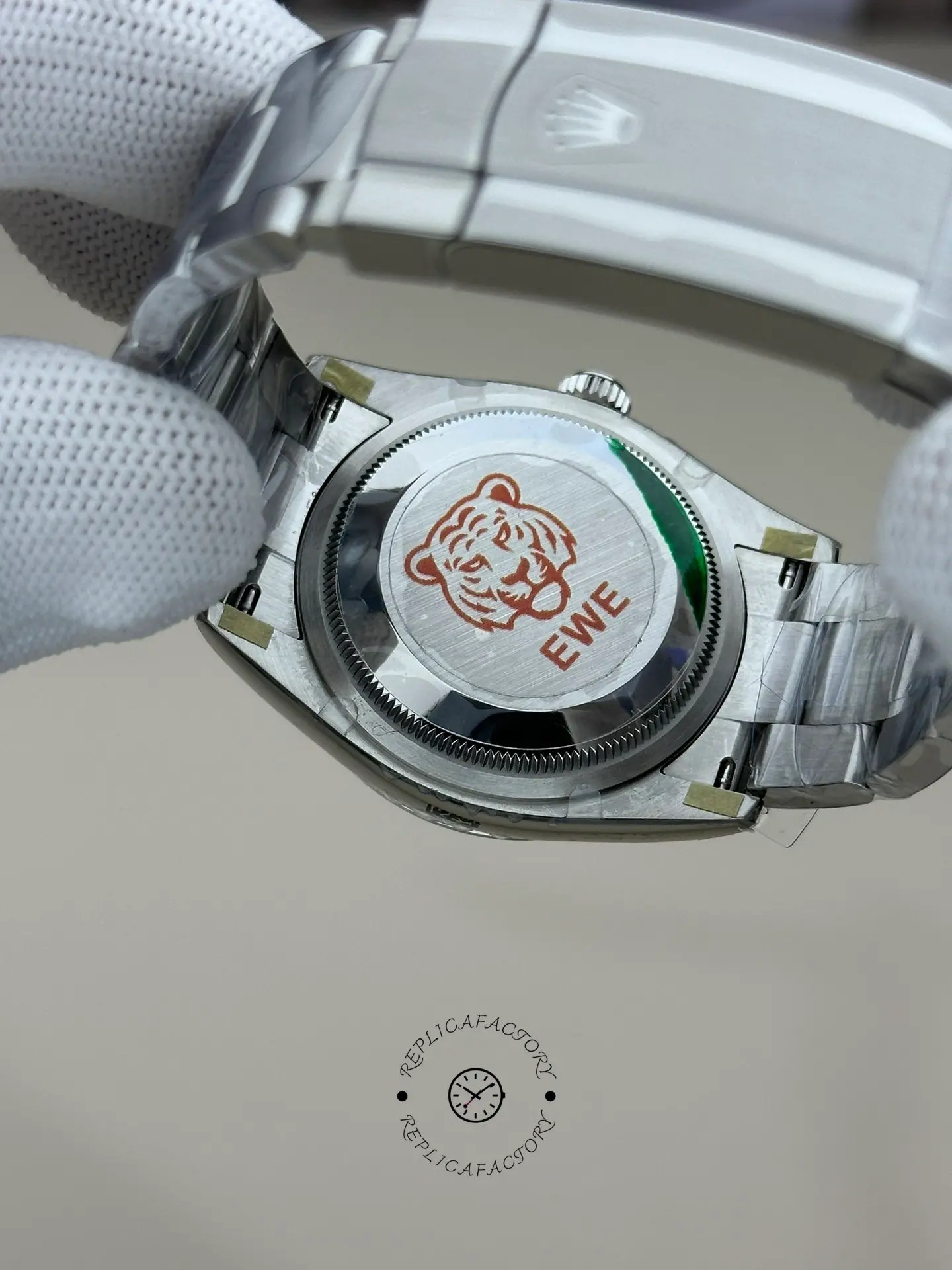 Rolex Oyster Perpetual 36 126000, caseback close-up showing sticker on solid back.