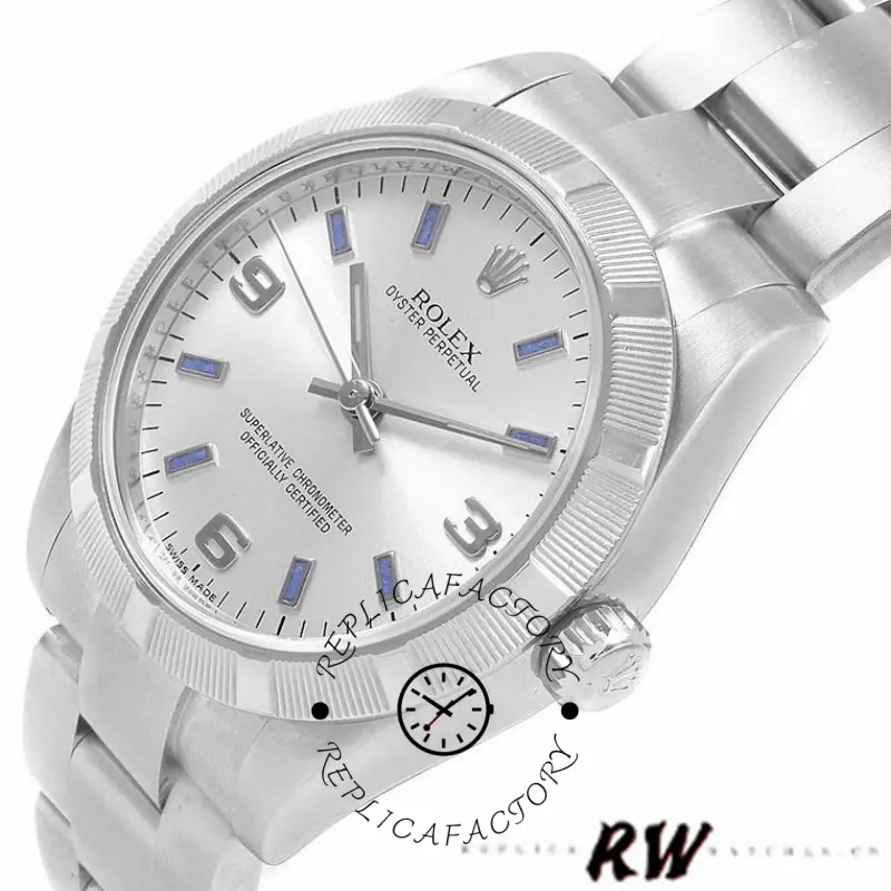 Rolex Oyster Perpetual 177210, dial close-up showing blue markers, hands, and smooth bezel.