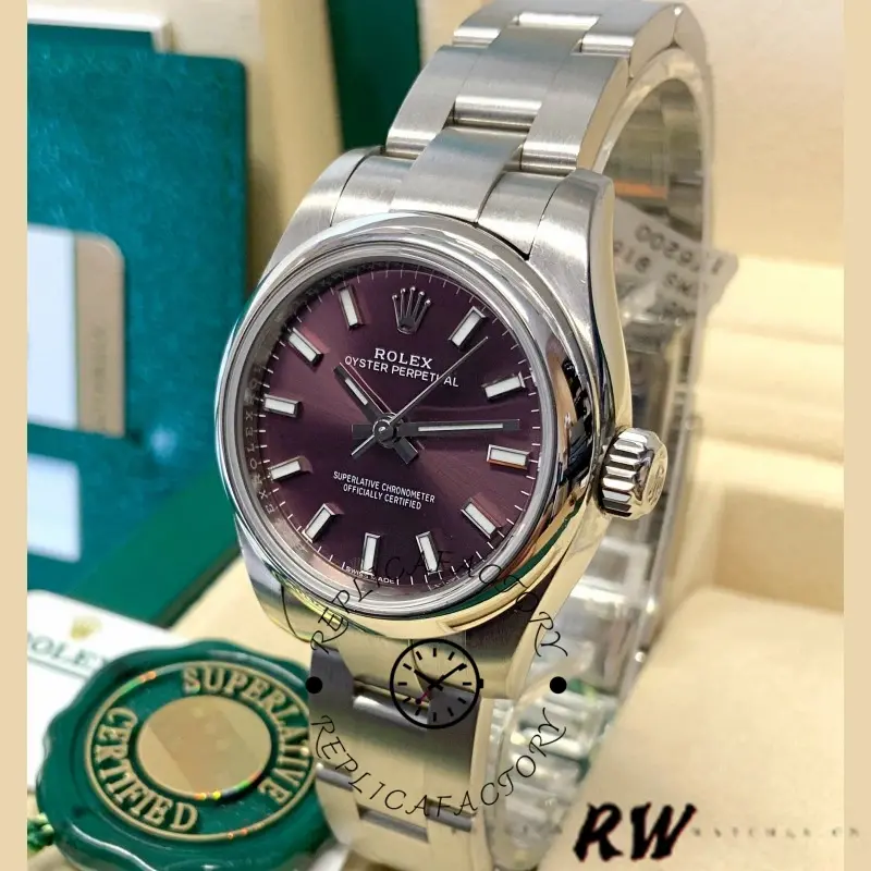 Rolex Oyster Perpetual 176200, angled wrist/hand shot, grape red dial, 26mm.