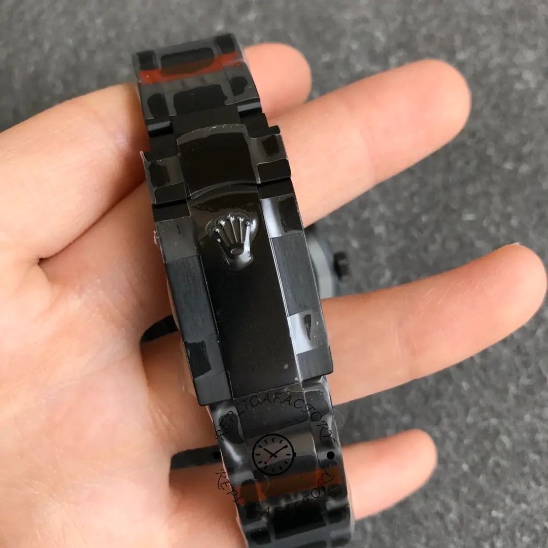 Rolex DiW Sky-Dweller 326934, clasp close-up showing engraved logo on black clasp.