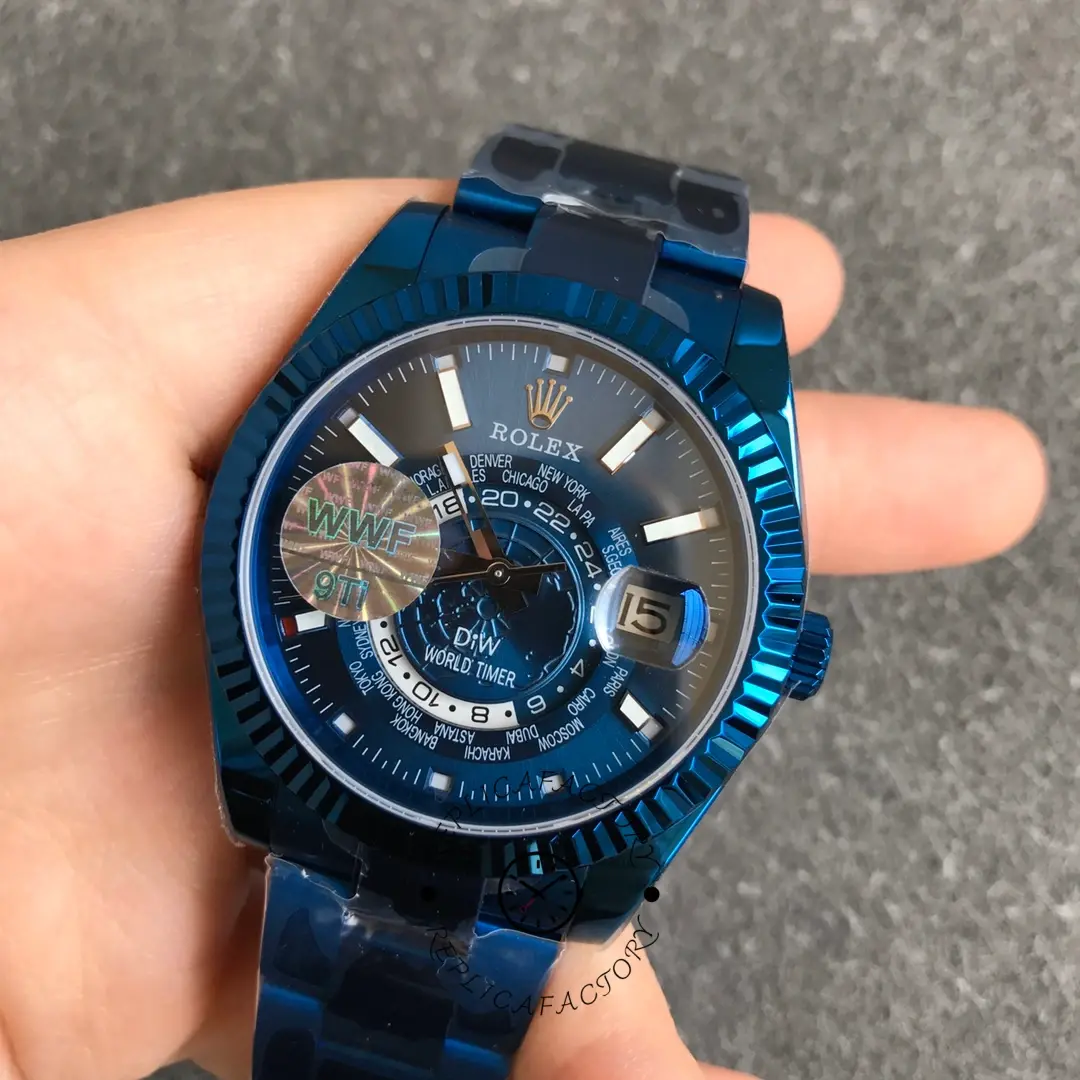 Dial-focused close-up of the Rolex DiW Sky-Dweller 326934, blue DLC case with skeleton-style layout.