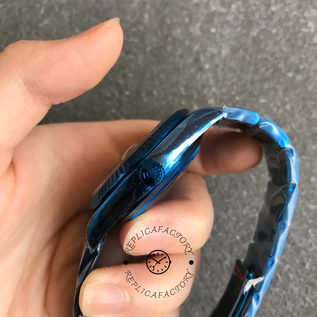 Side profile in hand of the Rolex DiW Sky-Dweller 326934, showing crown and bracelet curve.