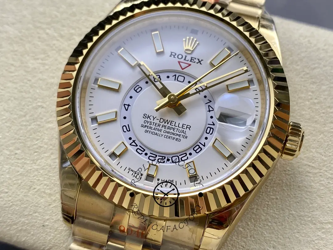 Rolex Sky-Dweller M336938 0006, front close-up, fluted bezel and hands on white dial.