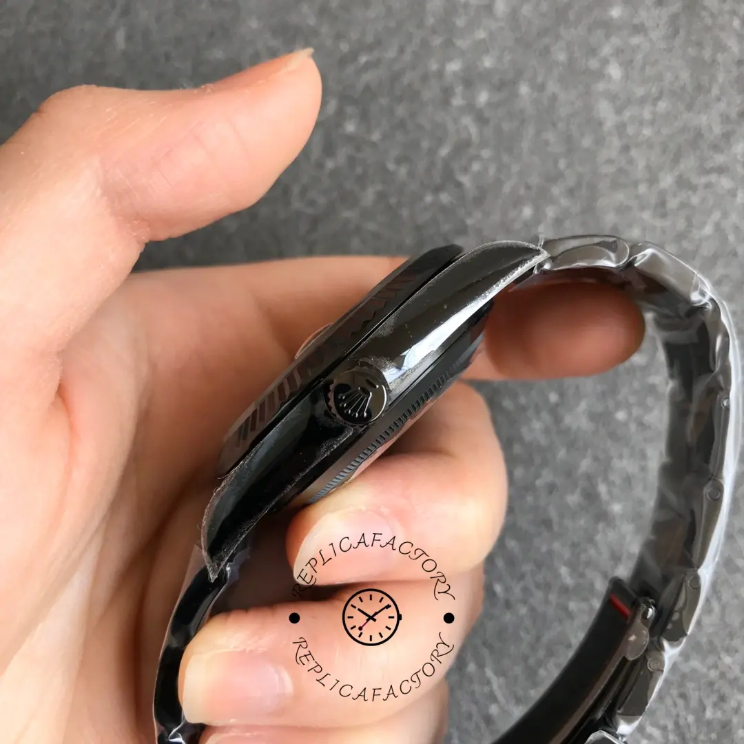 Rolex DiW Sky-Dweller 326934, side profile in hand showing crown.