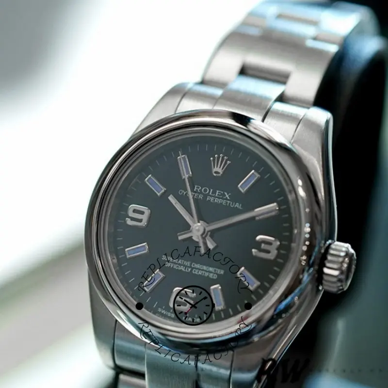 Rolex Oyster Perpetual 176200 wrist angle, blue index dial and smooth bezel detail.