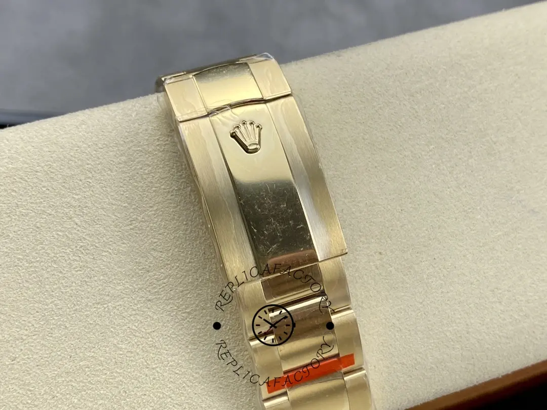 Clasp close-up of the Rolex Sky-Dweller M336938 0003 showing gold clasp and engraving.