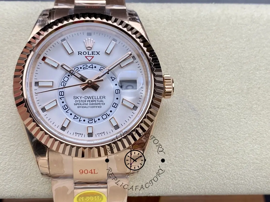 Rolex Sky-Dweller M336935 0003 on pillow, front view showing white dial and rose gold bracelet.