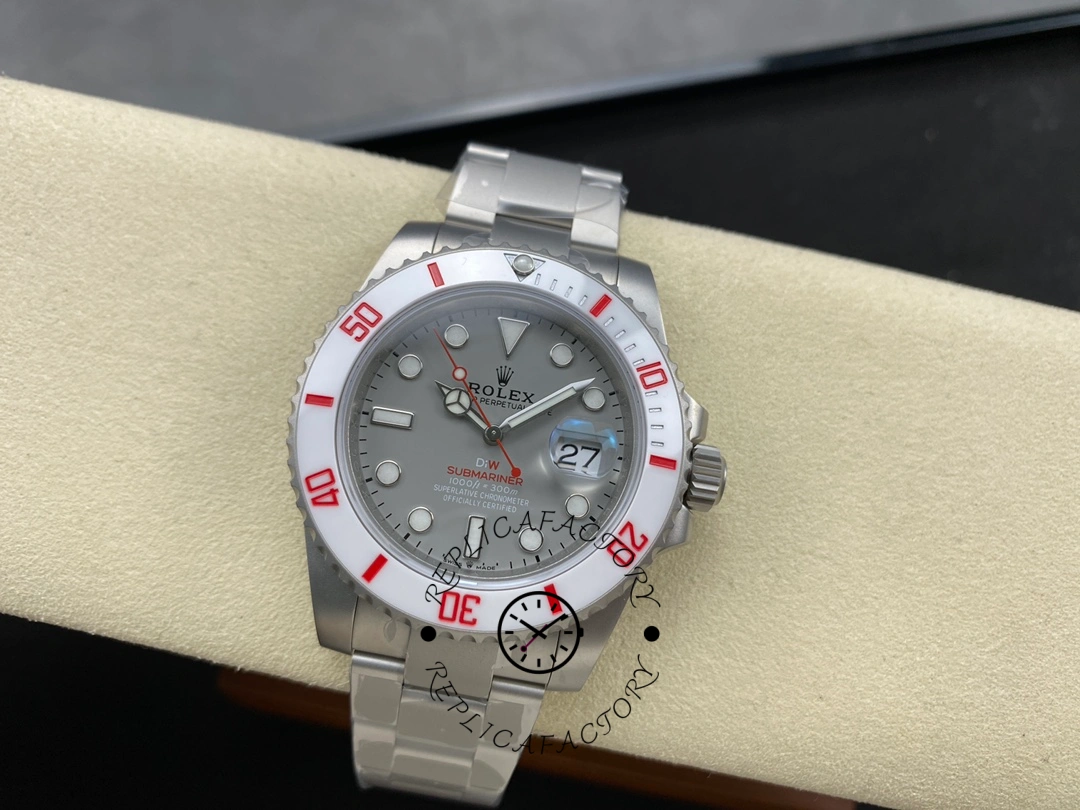 Small front view of the Rolex DIW Submariner Date 116610 on cushion showing grey dial.