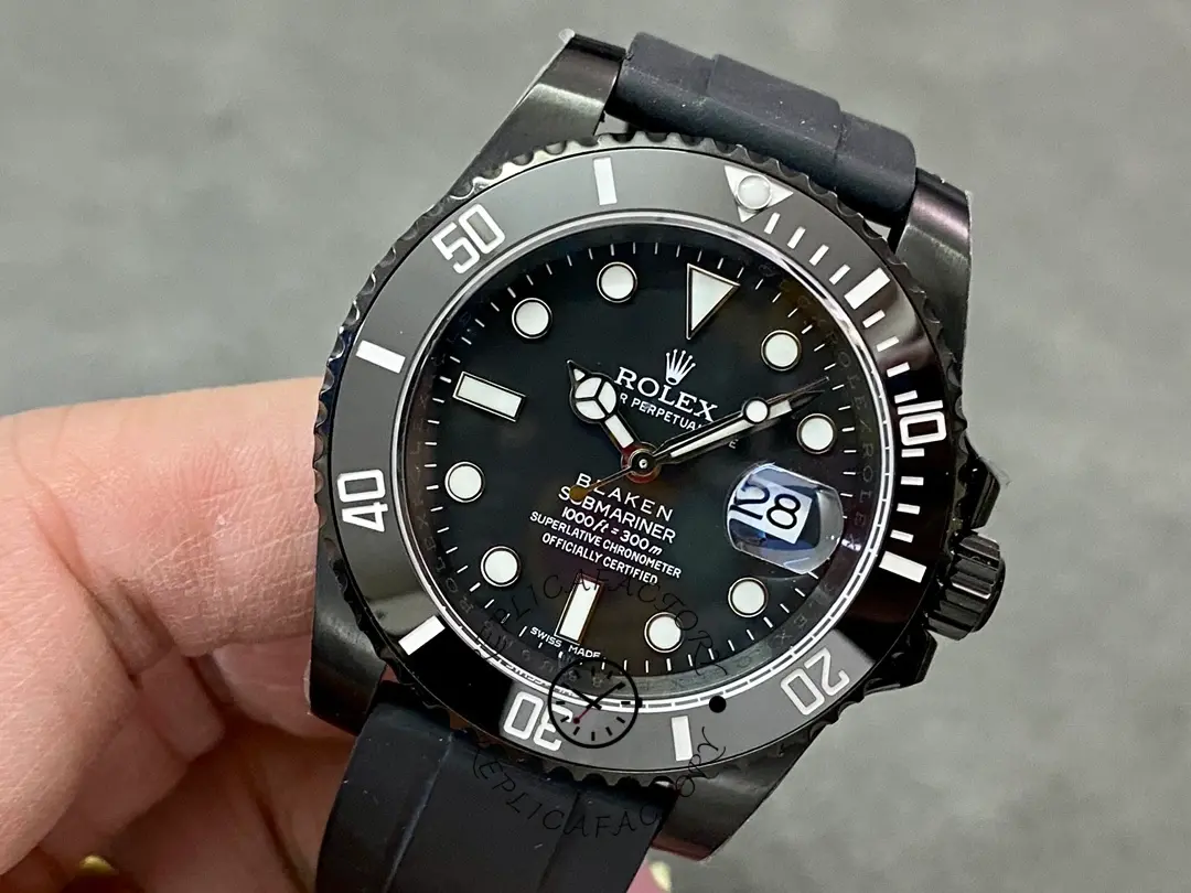 Rolex Blaken Submariner 116610, front close-up with rubber strap visible.