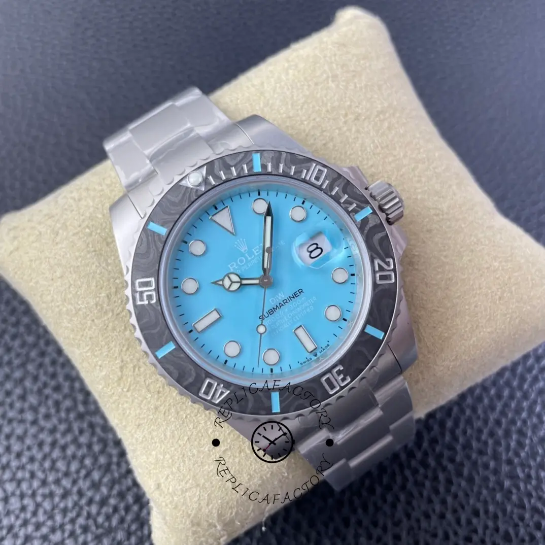 Angled view of Rolex Submariner DIWF 116610 on pillow showing case and carbon bezel edge.