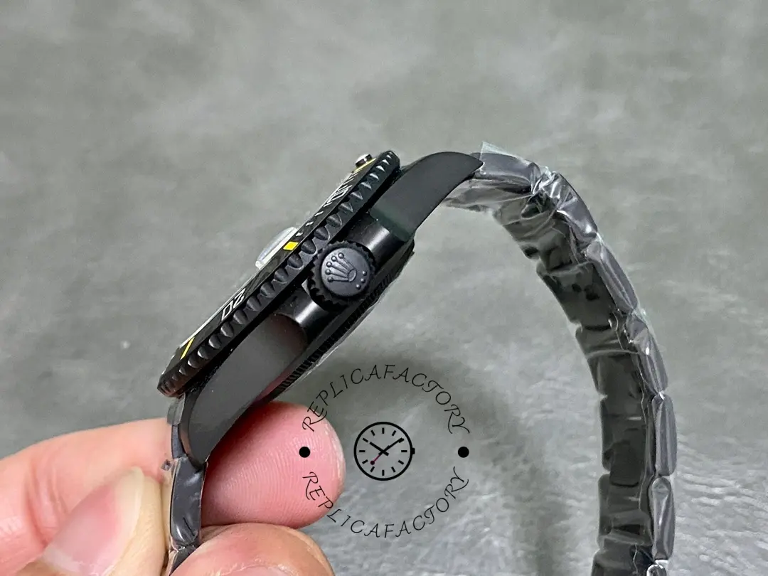 Rolex Submariner 116610, PVD/DLC strap side view, showing crown.