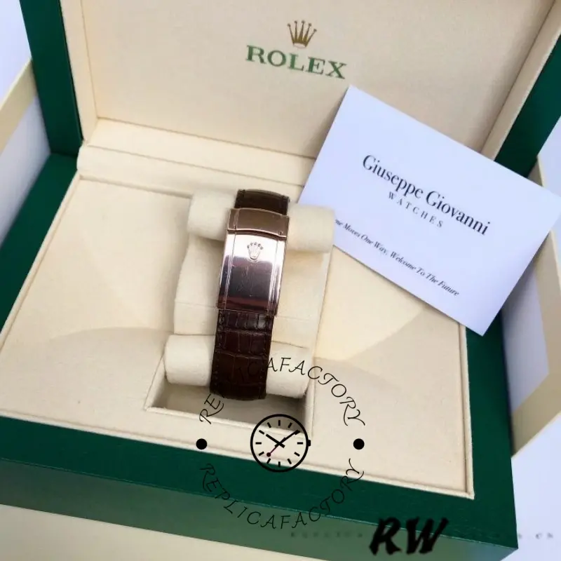 Side view of the Rolex Sky-Dweller 326135 in box showing strap profile and clasp area.