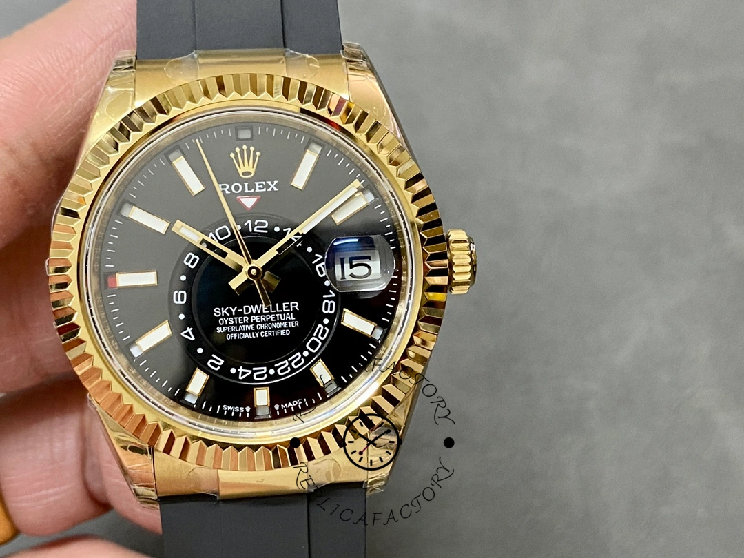 Handheld close-up of the Rolex Sky-Dweller m336238 0002 showing black dial and subdials.