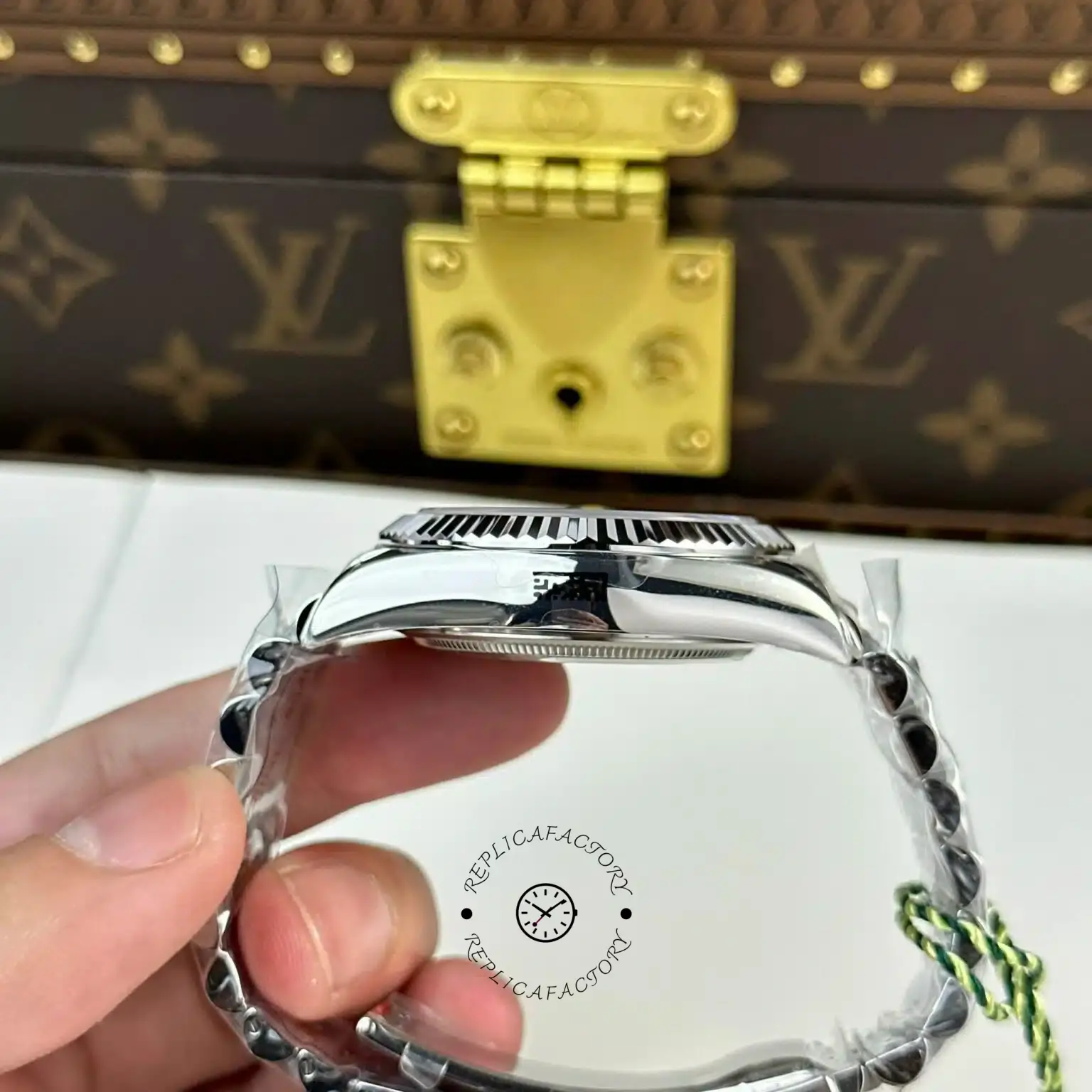 Opposite side view of Rolex Sky-Dweller m336934 0008 held in hand, showing lugs and bracelet fit.