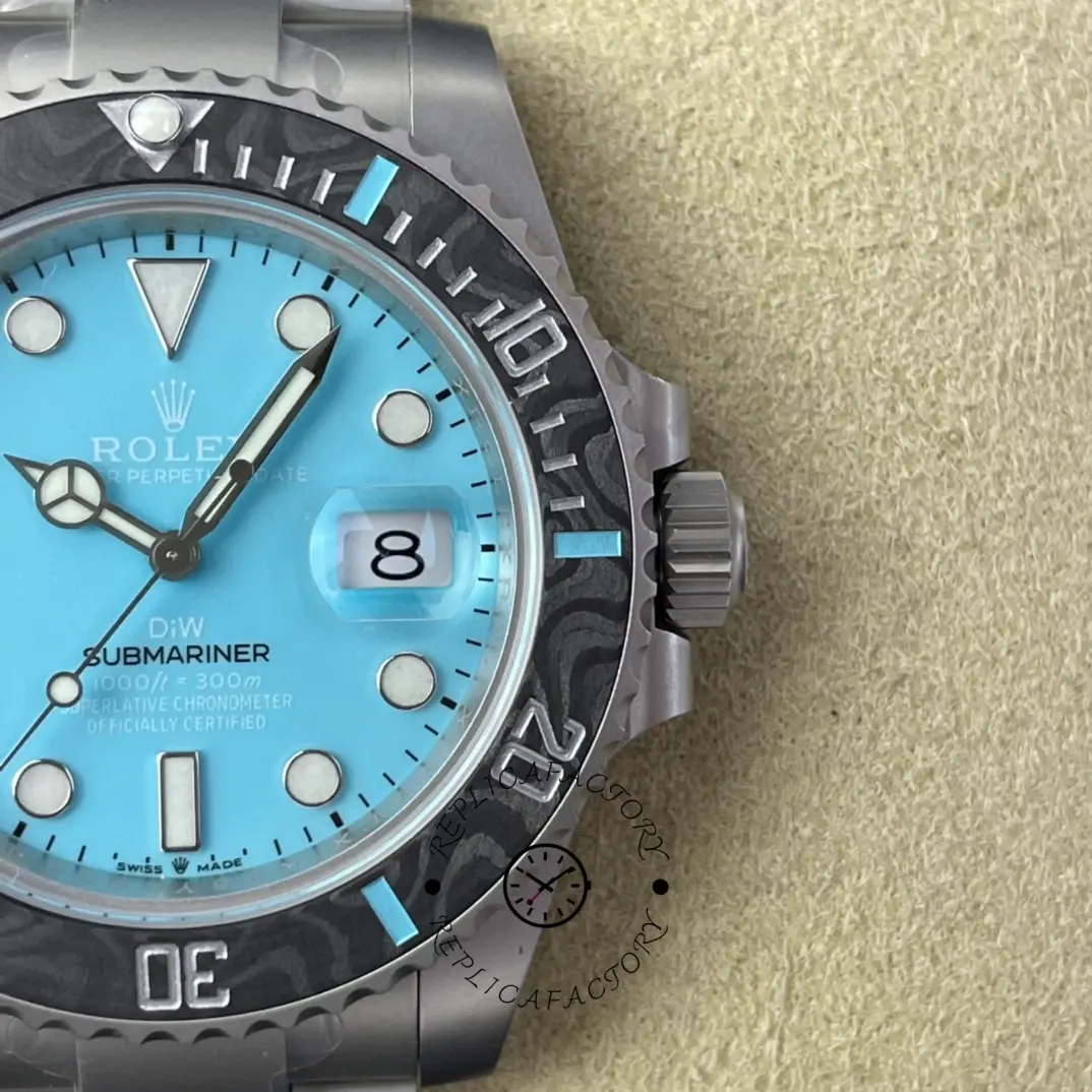 Dial close-up of Rolex Submariner DIWF 116610 showing ice blue texture, date window, and bezel scale.