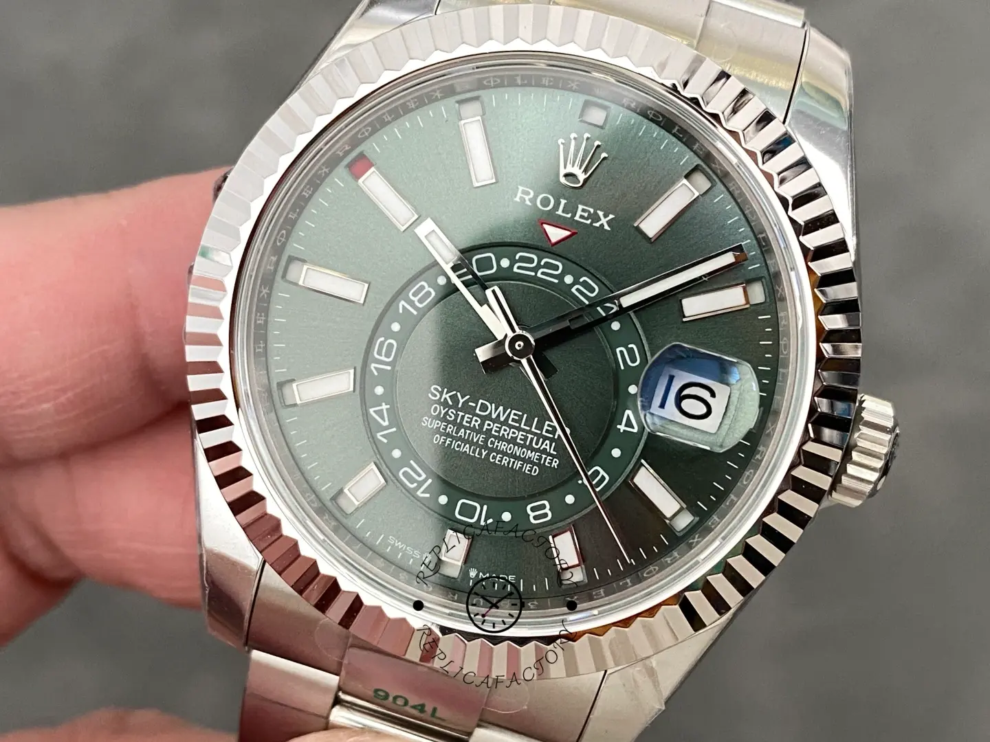 Angled wrist view of Rolex Sky-Dweller 336934 with fluted bezel and Oyster bracelet.
