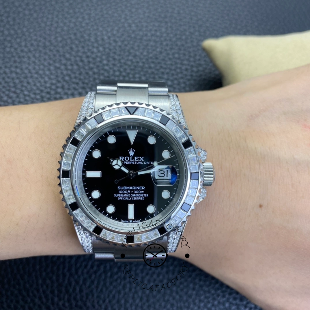 Rolex Submariner 116610, wrist shot showing black dial and diamond case on bracelet.