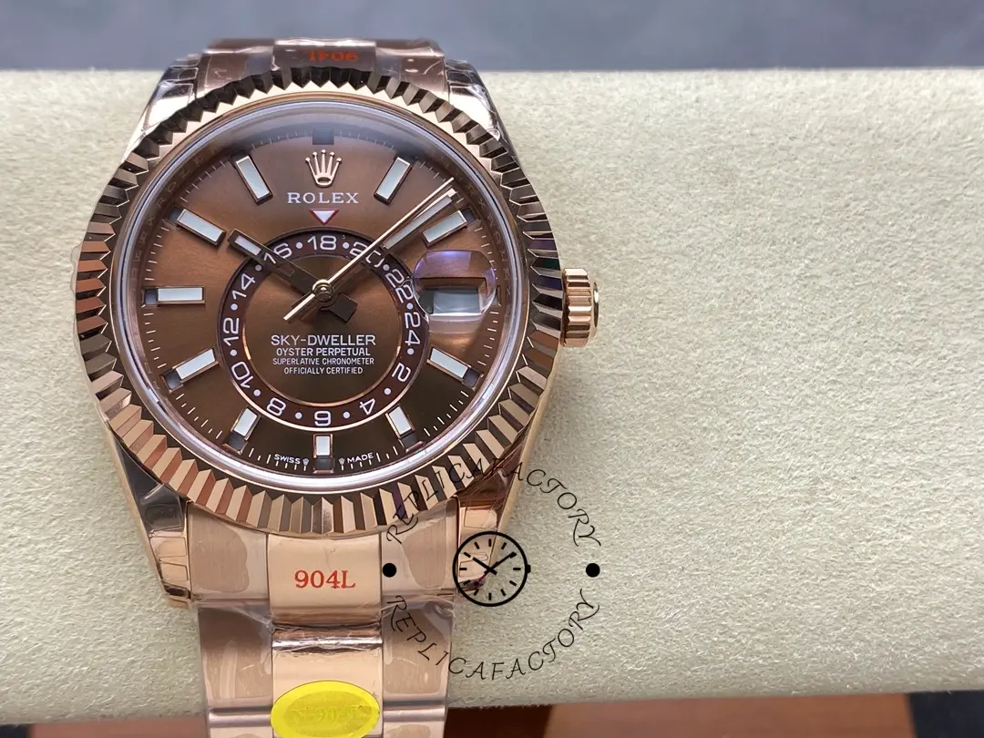 Rolex Sky-Dweller 336935 0002, front on cushion, chocolate dial on Oyster bracelet.