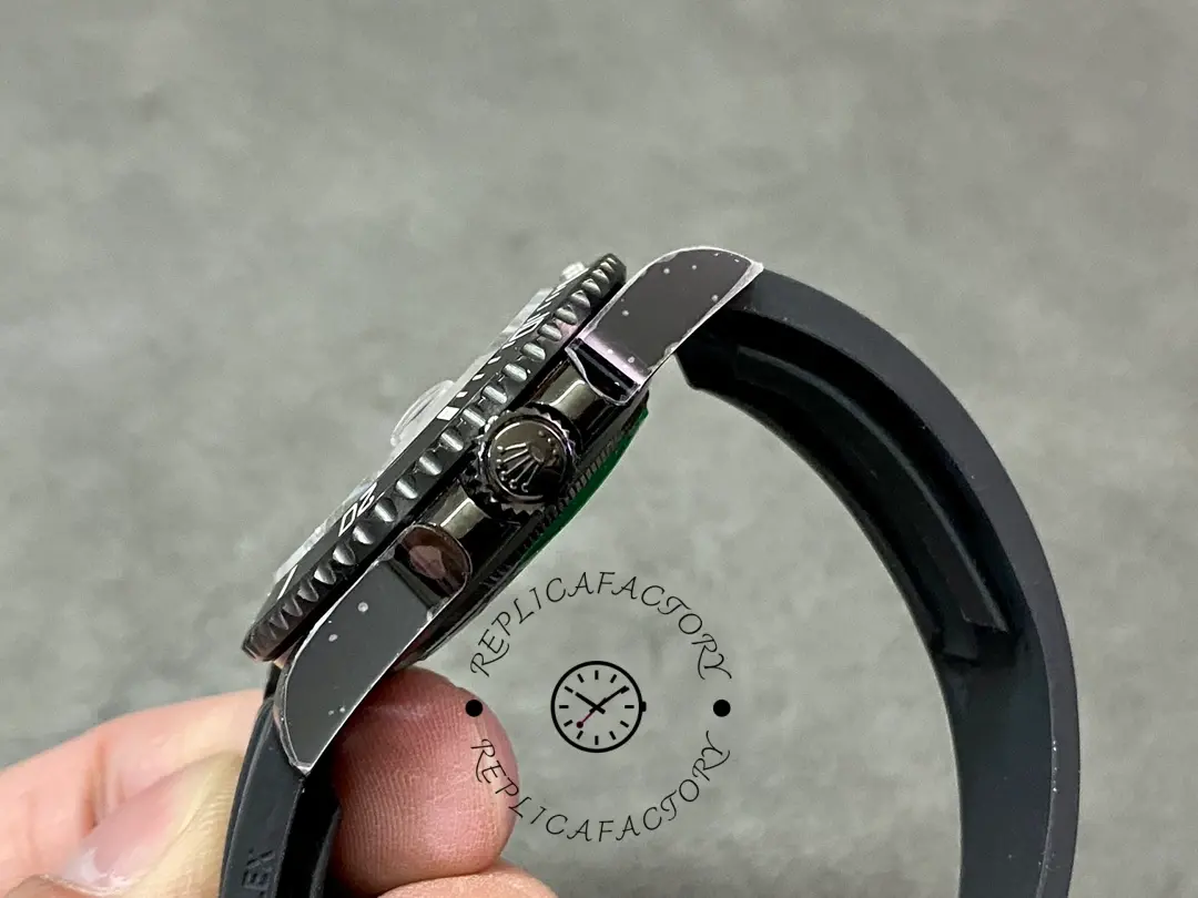 Rolex Blaken Submariner 116610, side close-up of bezel edge and crown area.