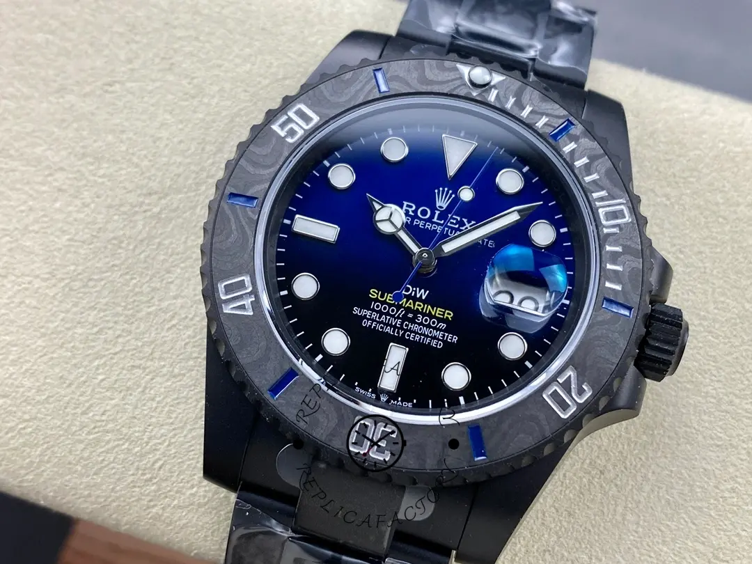 Cushion close-up of Rolex Submariner DIW 116610 showing blue dial details and carbon bezel texture.