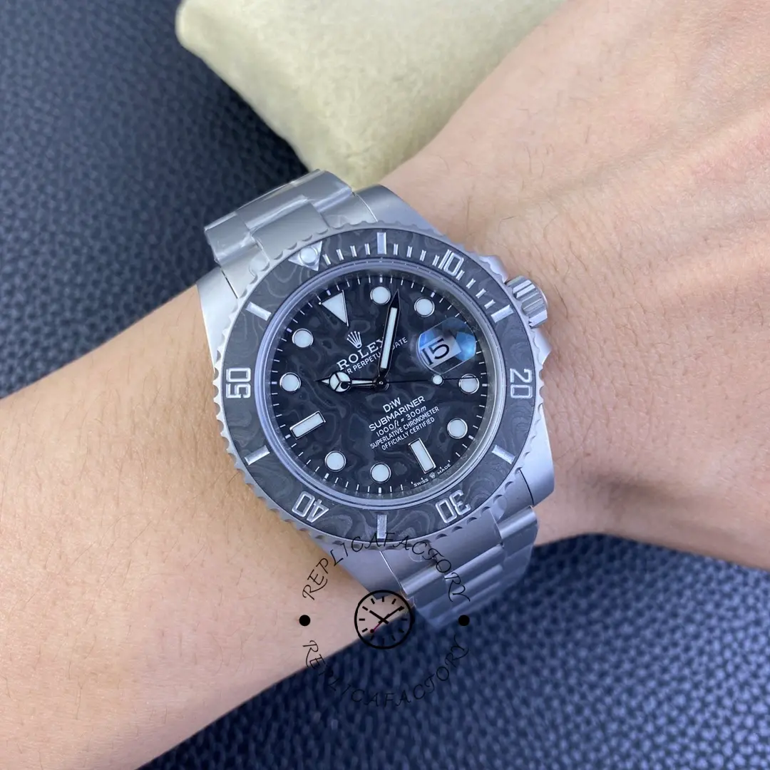 Wrist shot of Custom Rolex Submariner 116610 carbon fiber showing black dial and bezel.