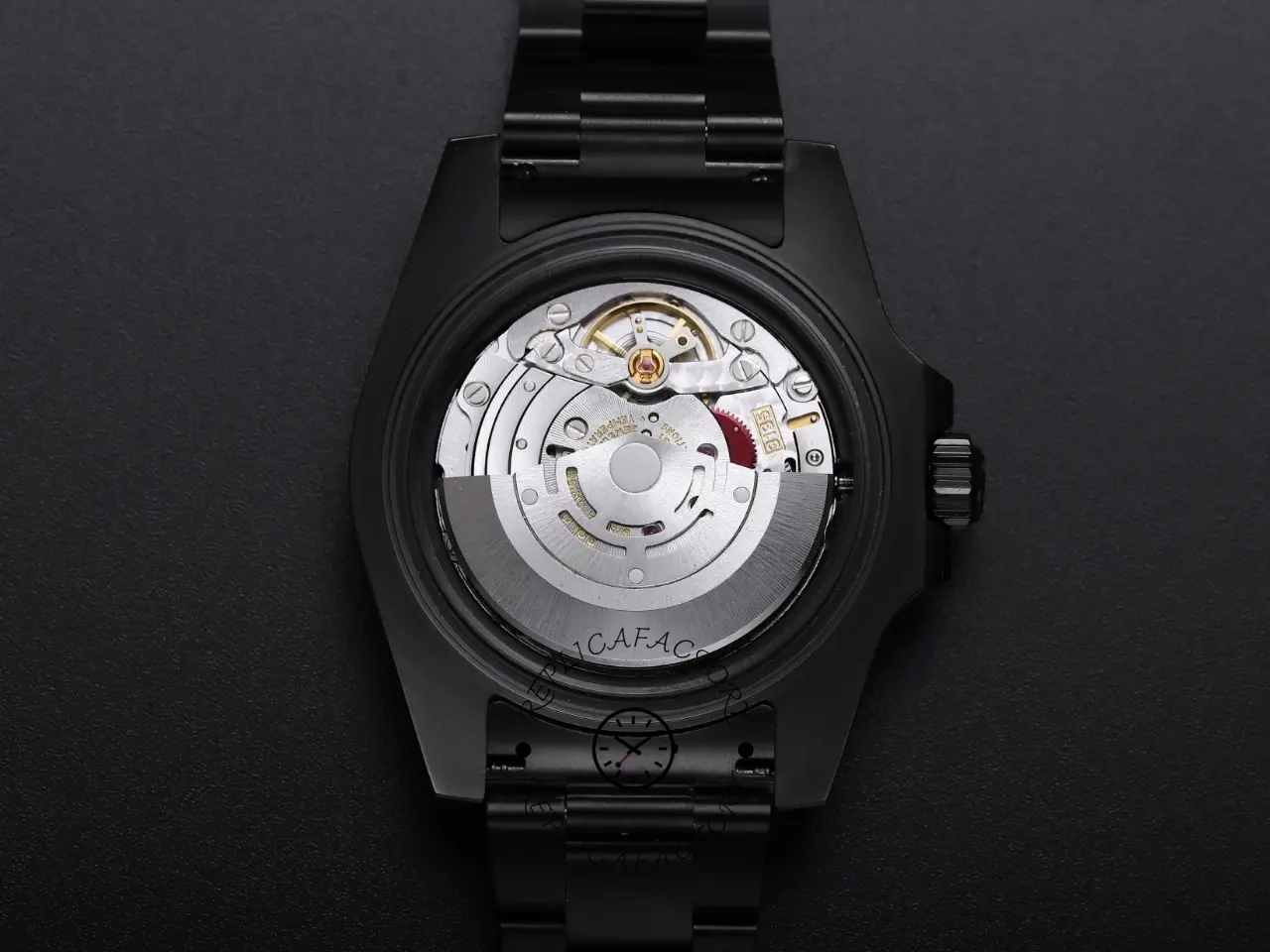 Caseback view of Rolex Submariner 116610LV showing back and black bracelet end links.