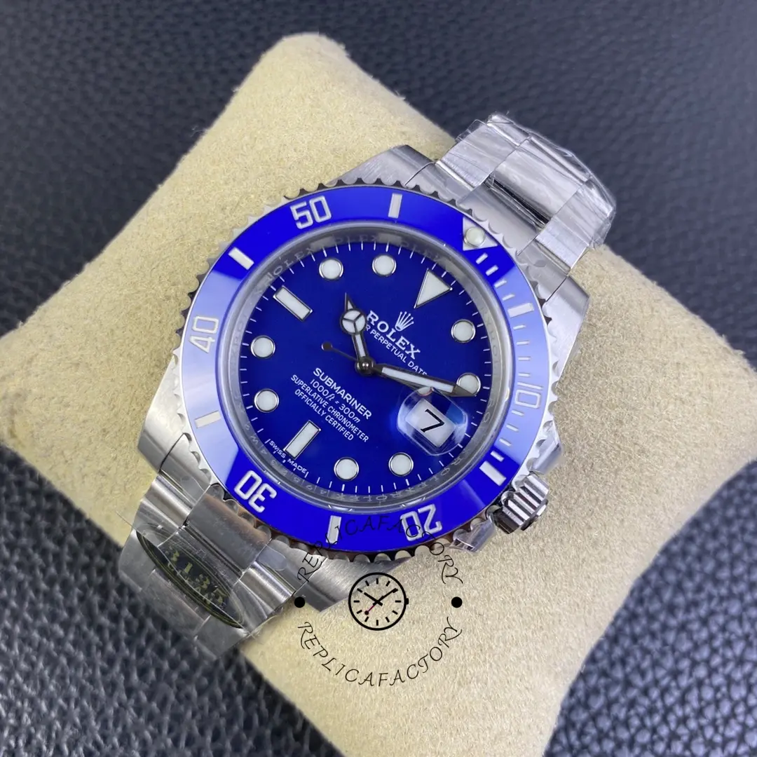 Rolex Submariner 116619LB, angled view on cushion highlighting blue ceramic bezel.