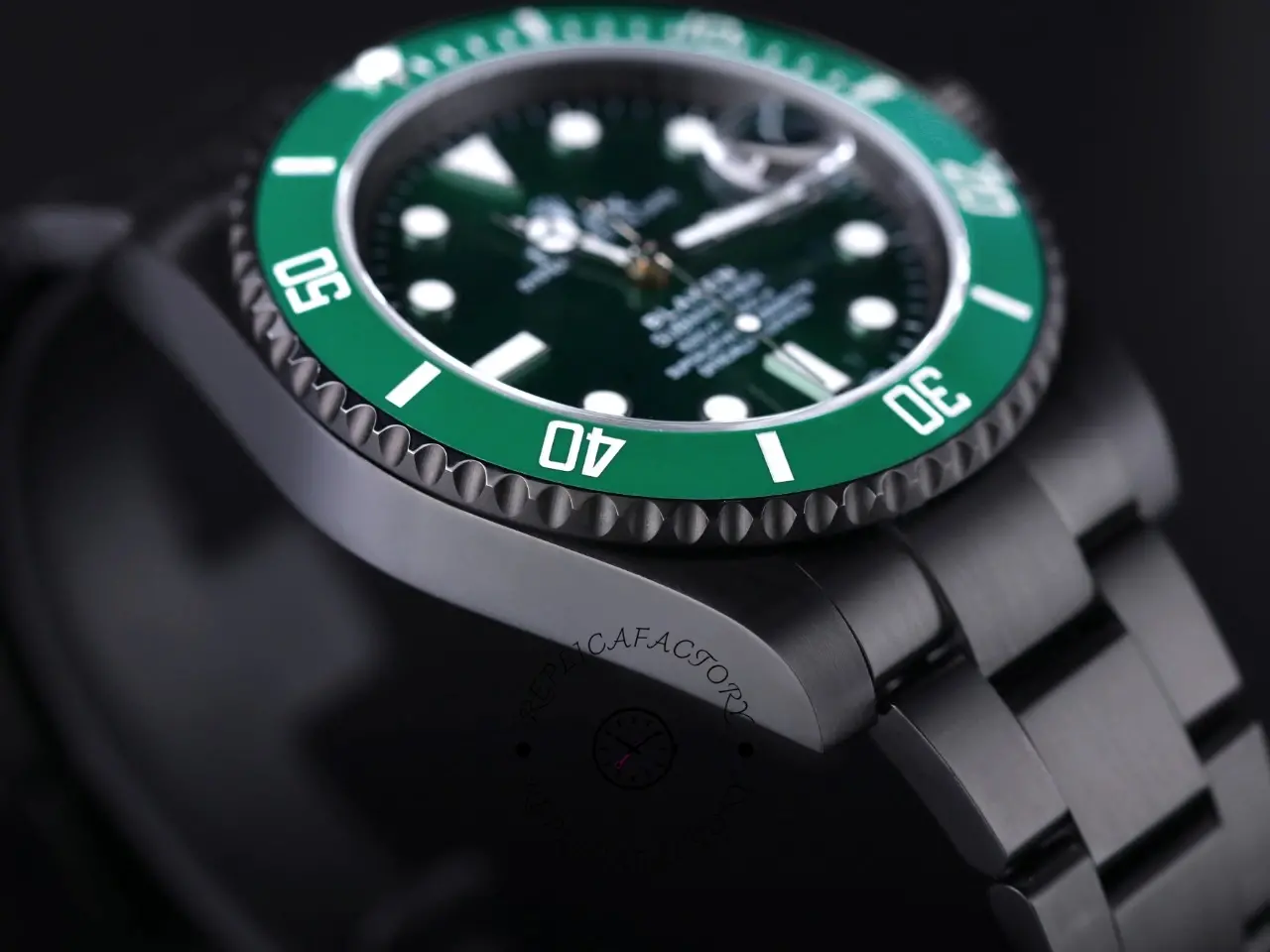 Macro close-up of Rolex Submariner 116610LV bezel edge and green insert with minute markings.