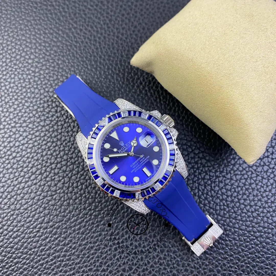 Top-down view of Rolex Submariner 116610 showing blue bezel insert, blue dial, and diamond-set case.