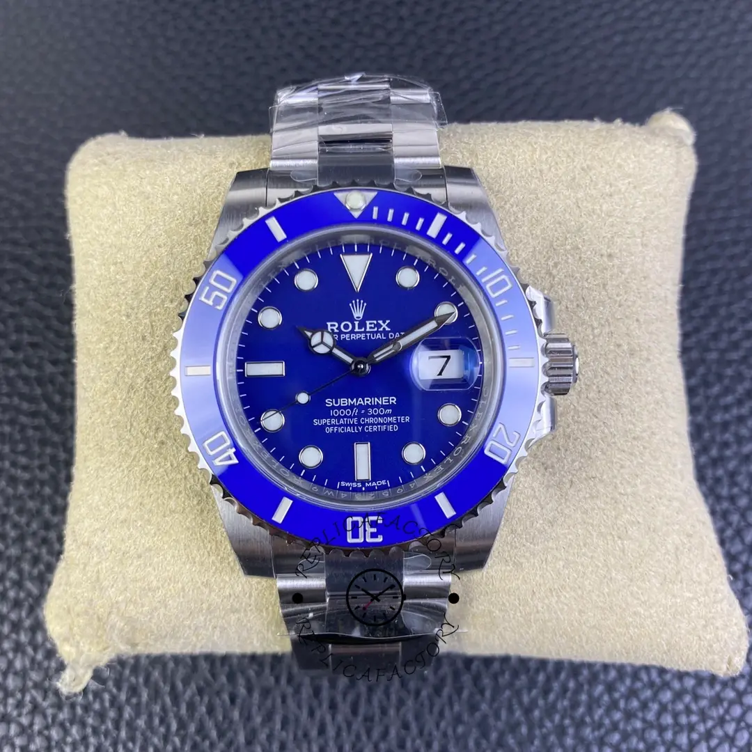 Rolex Submariner 116619LB, blue dial on beige cushion, straight-on wristwatch display.