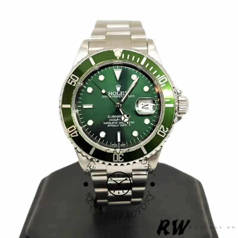 Rolex Submariner 16610, front view on stand with green dial.