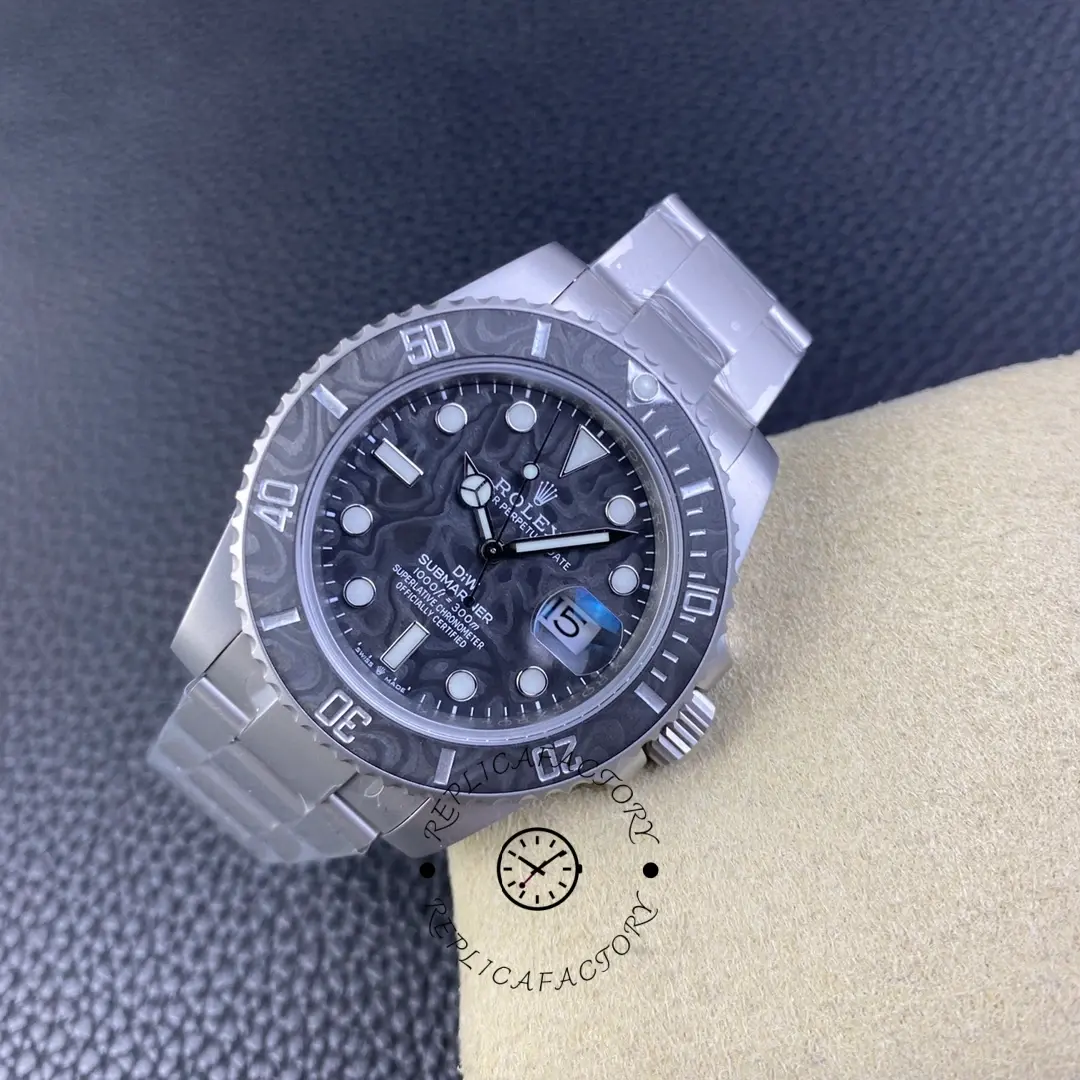 Angled view of Custom Rolex Submariner 116610 carbon fiber on bracelet, on cushion.