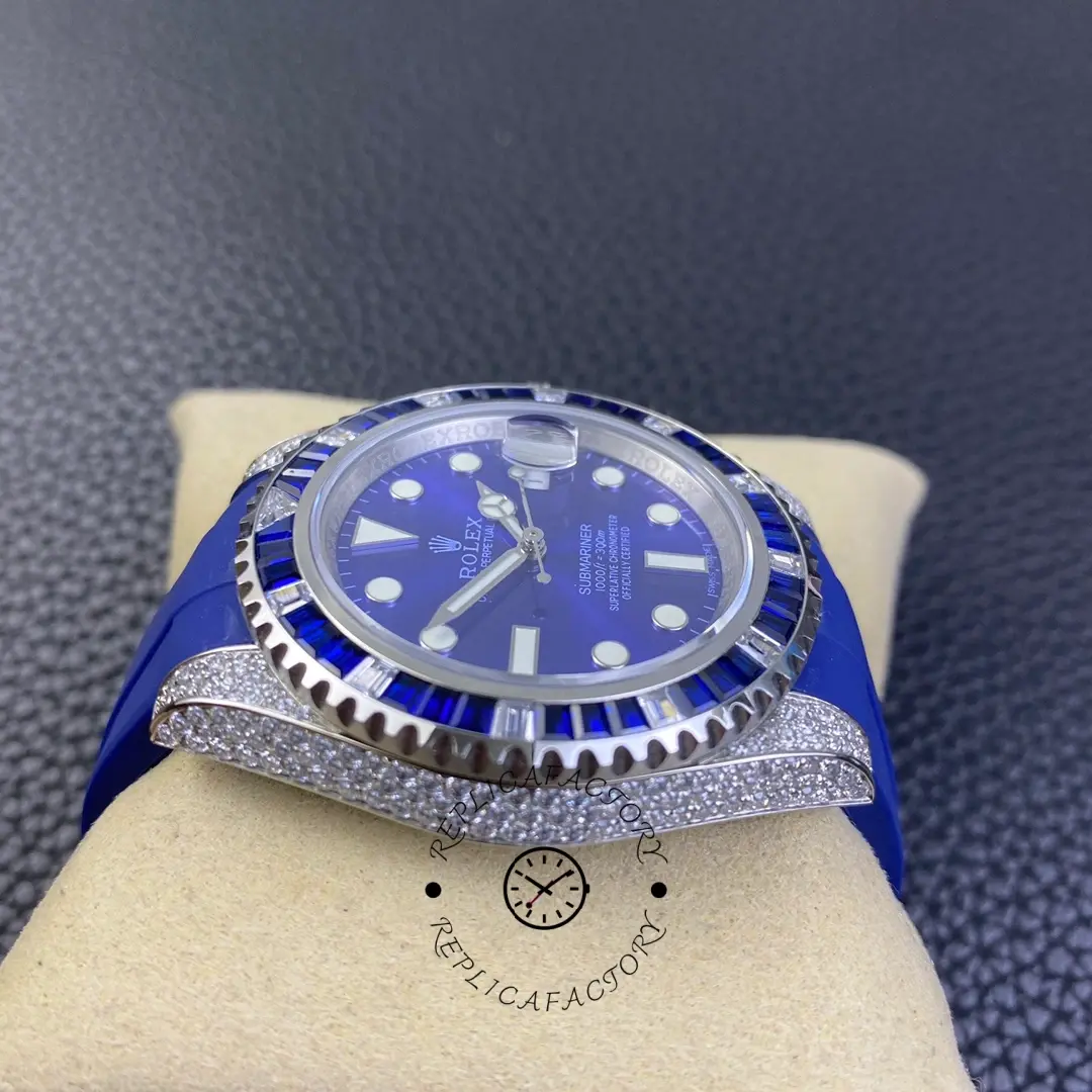 Bezel and dial close-up of Rolex Submariner 116610 showing luminous hour plots and Cyclops date lens.