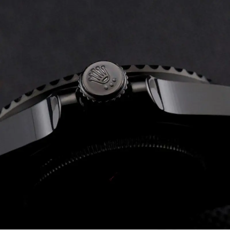 Rolex Submariner PR16233BBL, crown close-up showing textured bezel and case lines.