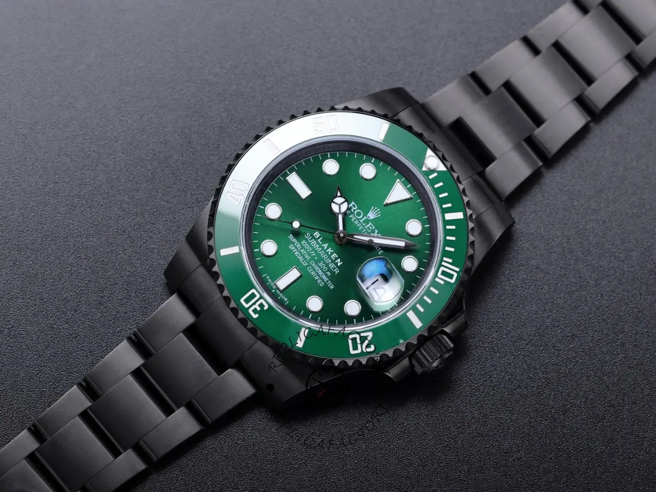 Angled shot of Rolex Submariner 116610LV showing black bracelet links and green bezel.
