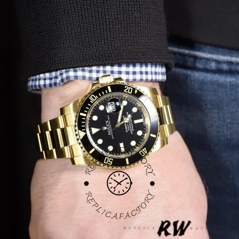 Wrist shot of the Rolex Submariner Date 116618LN showing gold case and black dial outdoors.