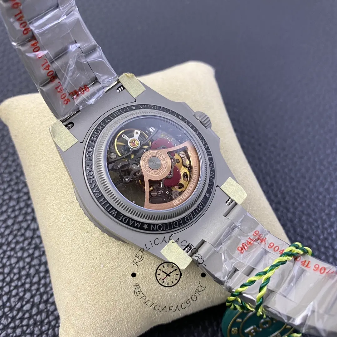 Rolex Submariner 114060, caseback view showing back cover area and protective stickers.