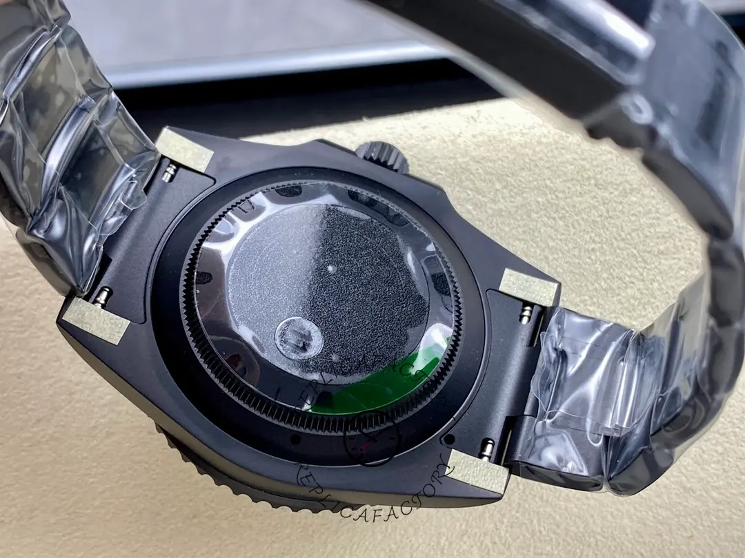 Caseback view of Rolex Submariner DIW 116610 showing back sticker and strap attachment.