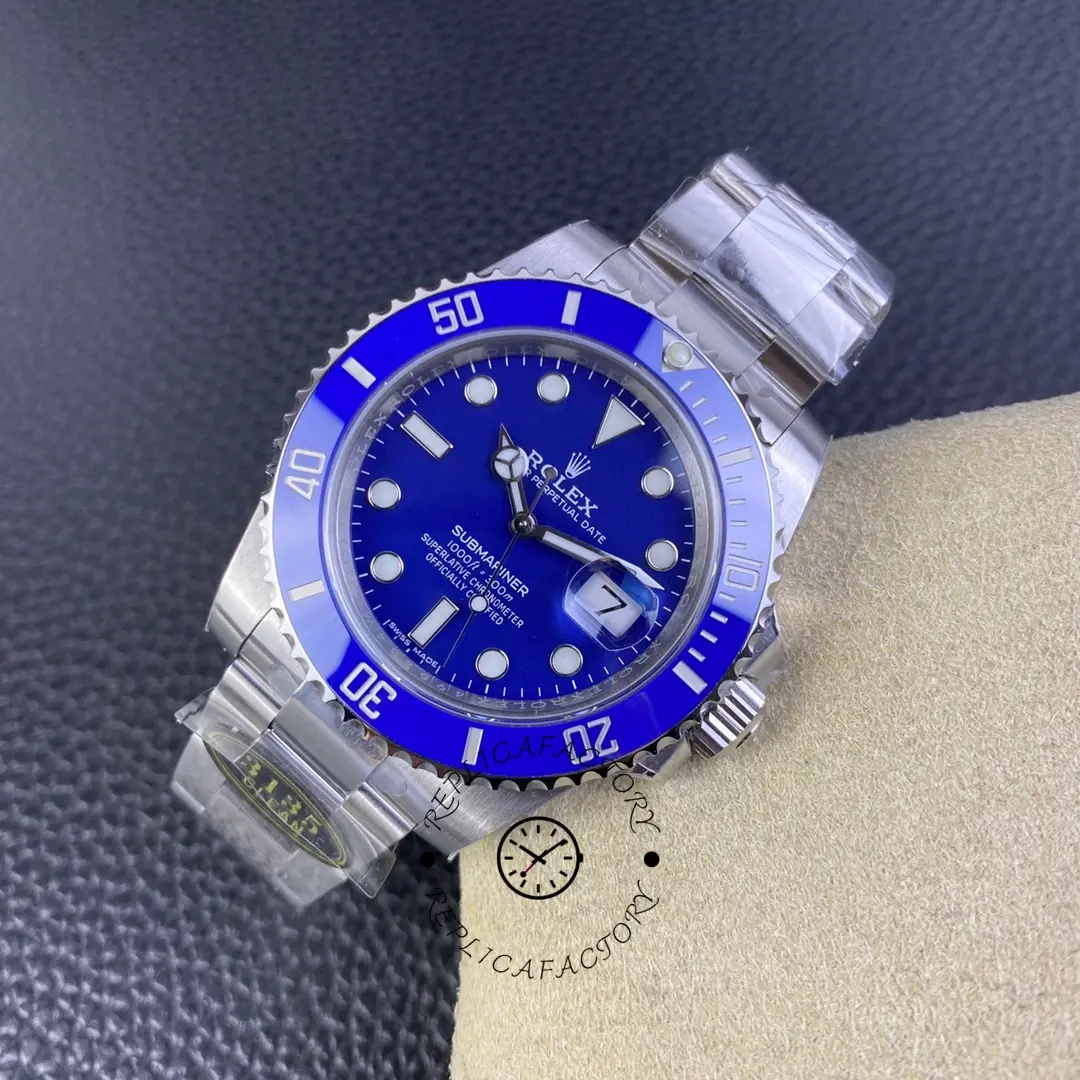 Rolex Submariner 116619LB, front view on cushion with bracelet partially opened.