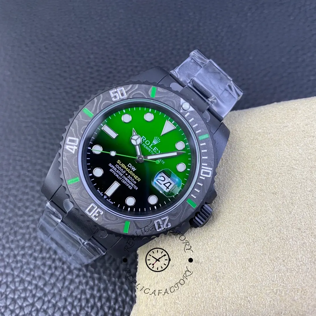 Rolex Submariner 116610LV on cushion showing green dial and carbon bezel.