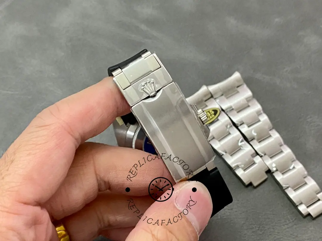 Rolex Submariner 126610LN, clasp close-up showing brushed steel clasp surface.
