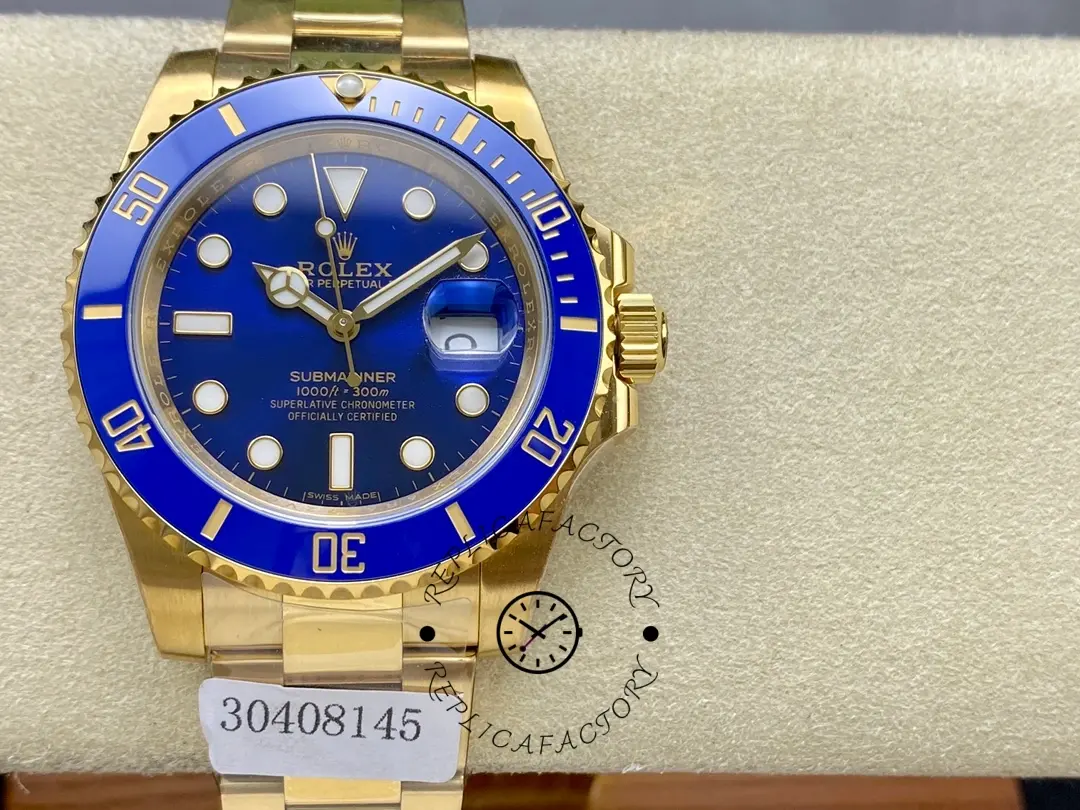 Rolex Submariner 116618, front view on cushion with blue bezel and gold bracelet.