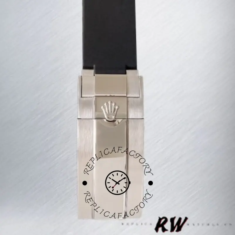 Rolex Submariner 116610, clasp close-up showing the folding buckle on rubber strap.